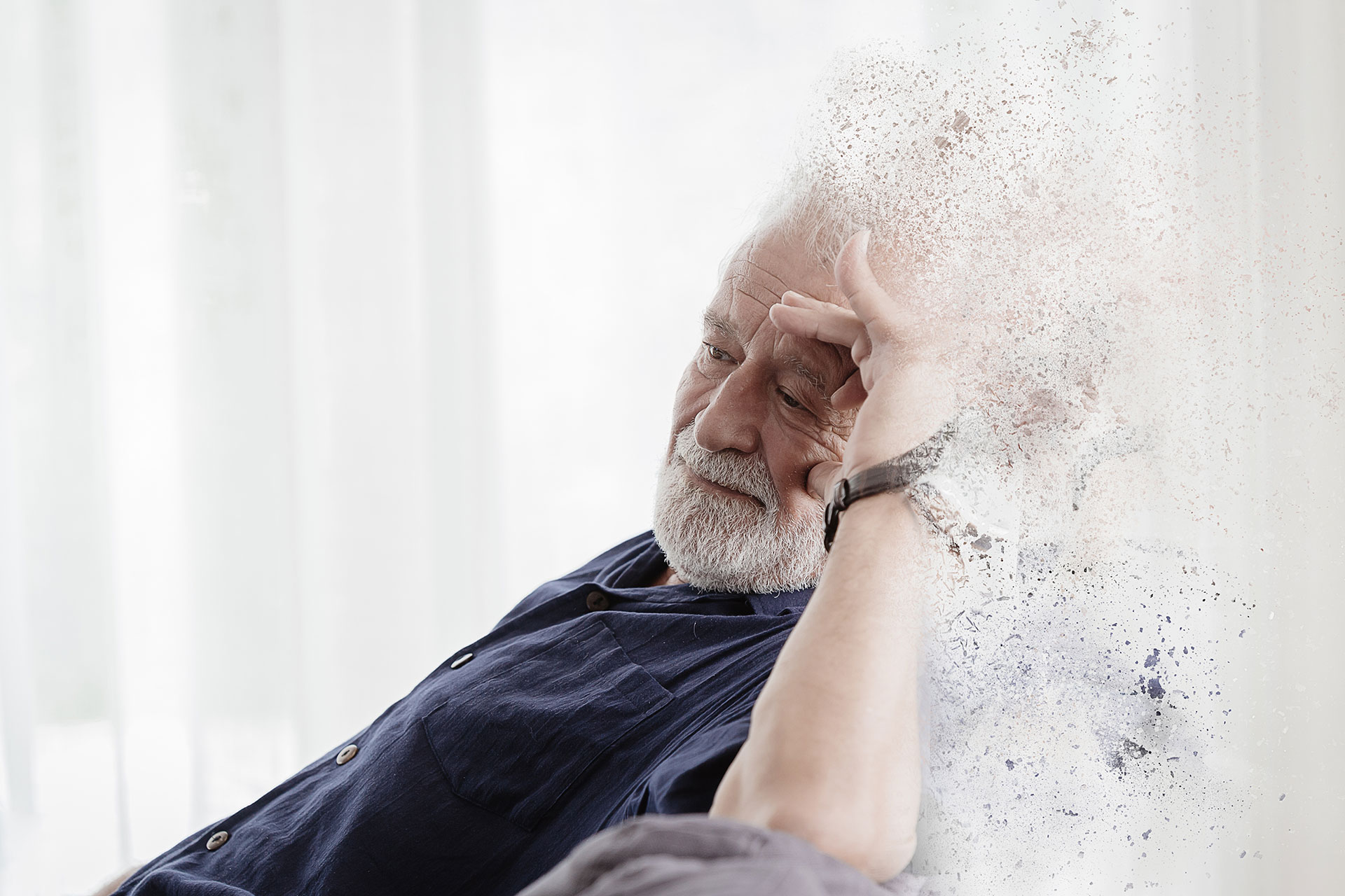The image shows an elderly man with his hand on his forehead, deep in thought, with a digitally manipulated effect that appears to be a hand reaching out from behind him, creating a surreal and contemplative atmosphere.