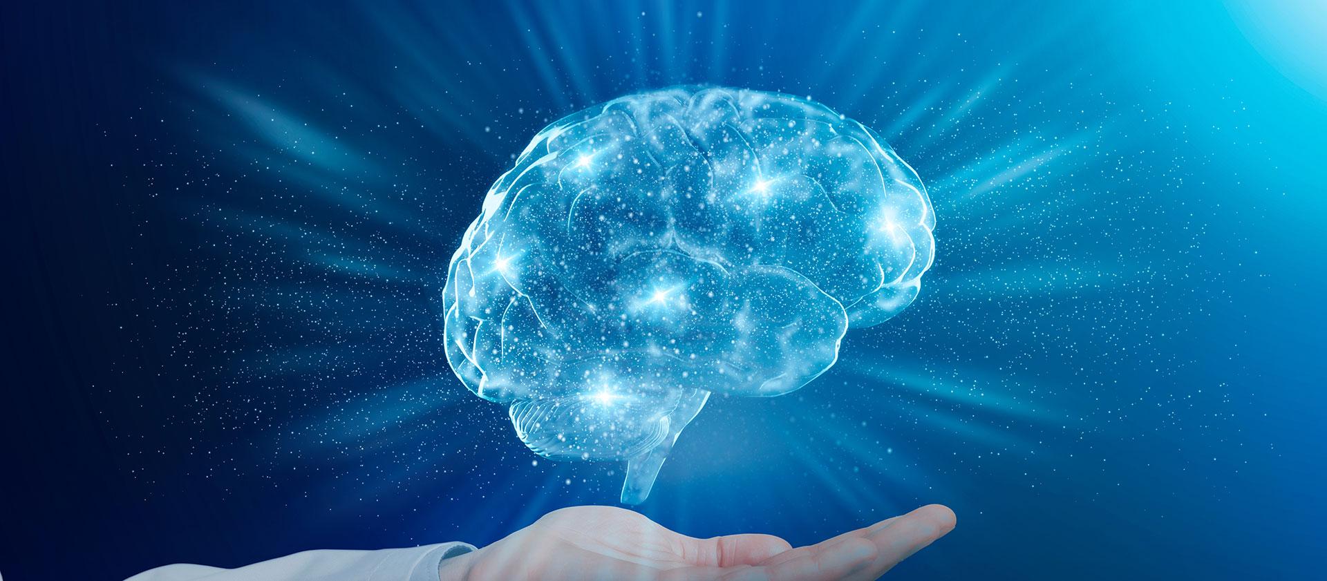 An alt text description of the image   A digital illustration featuring a human hand holding a glowing brain with starry cosmic background, symbolizing intelligence and the universe.